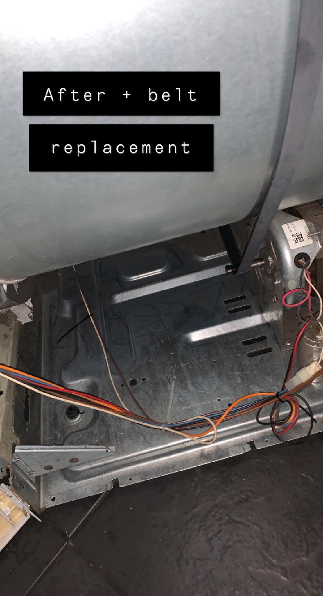 Inside tumble dryer after belt replacement and cleaning