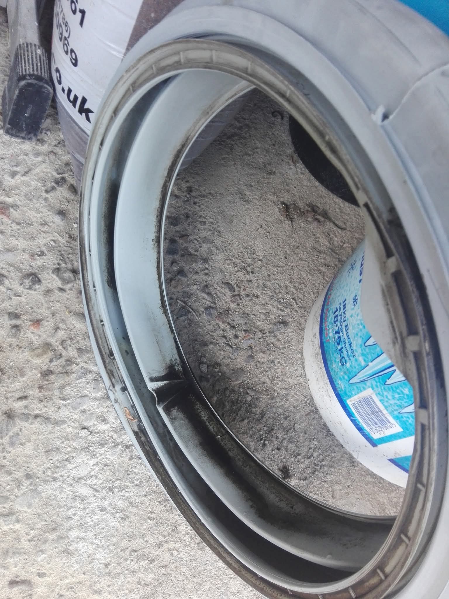 Blocked washing machine drum — before repair